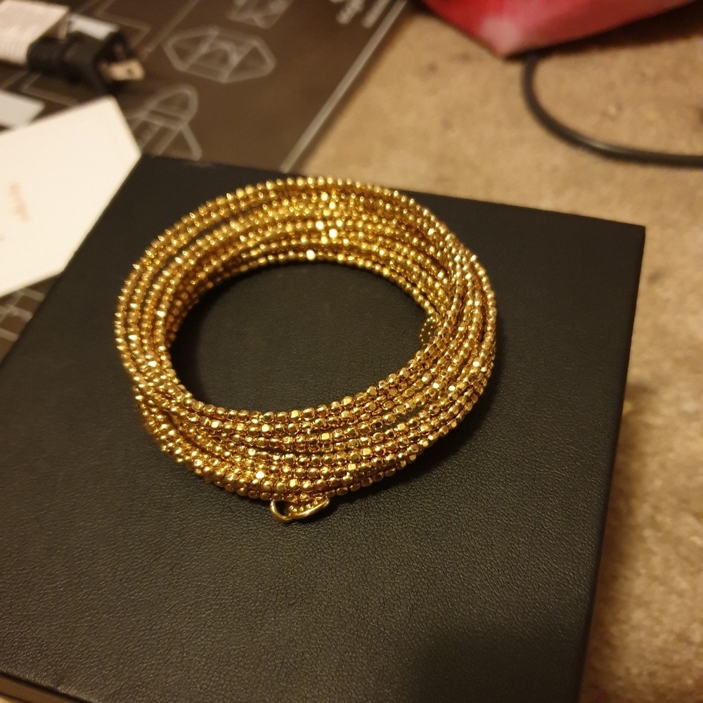 Gold wire wrap bangle bracelet
